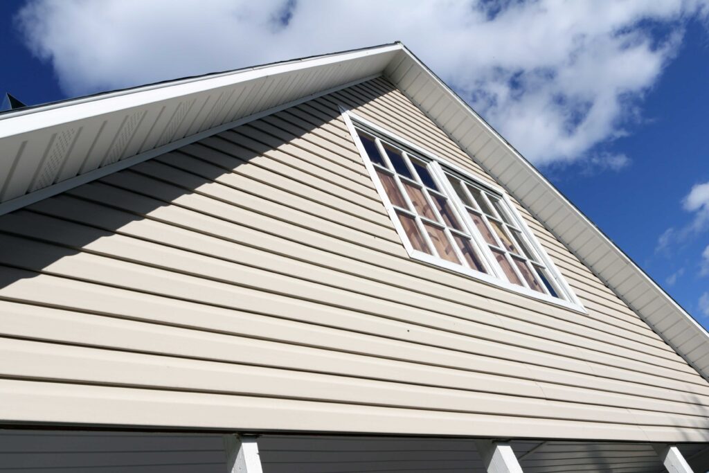 Vinyl siding installation on a residential home exterior in Cleveland, OH
