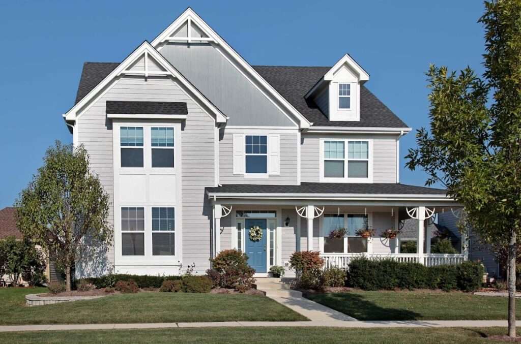 Modern gray home exterior with porch in Northfield, OH