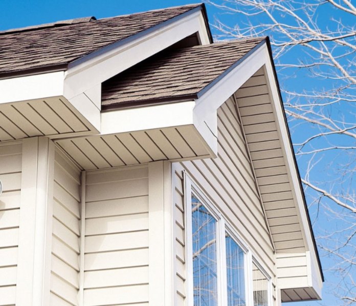 Home Exterior Featuring Newly Installed Vinyl Siding with Matching Gable Trim in Cleveland, OH