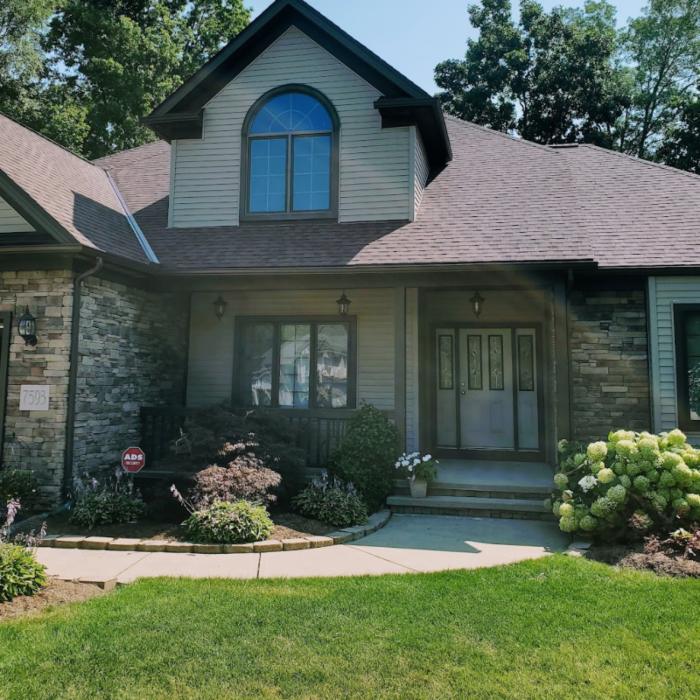 A Home with a Newly Replaced Asphalt Shingle Roof with Multiple Rooflines in Northfield, OH