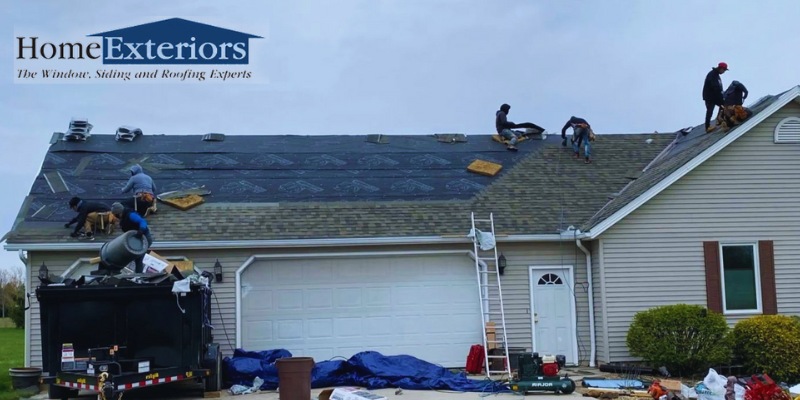 Multiple Workers Performing Roof Repairs and Shingle Replacement for a Home in Broadview Heights, OH